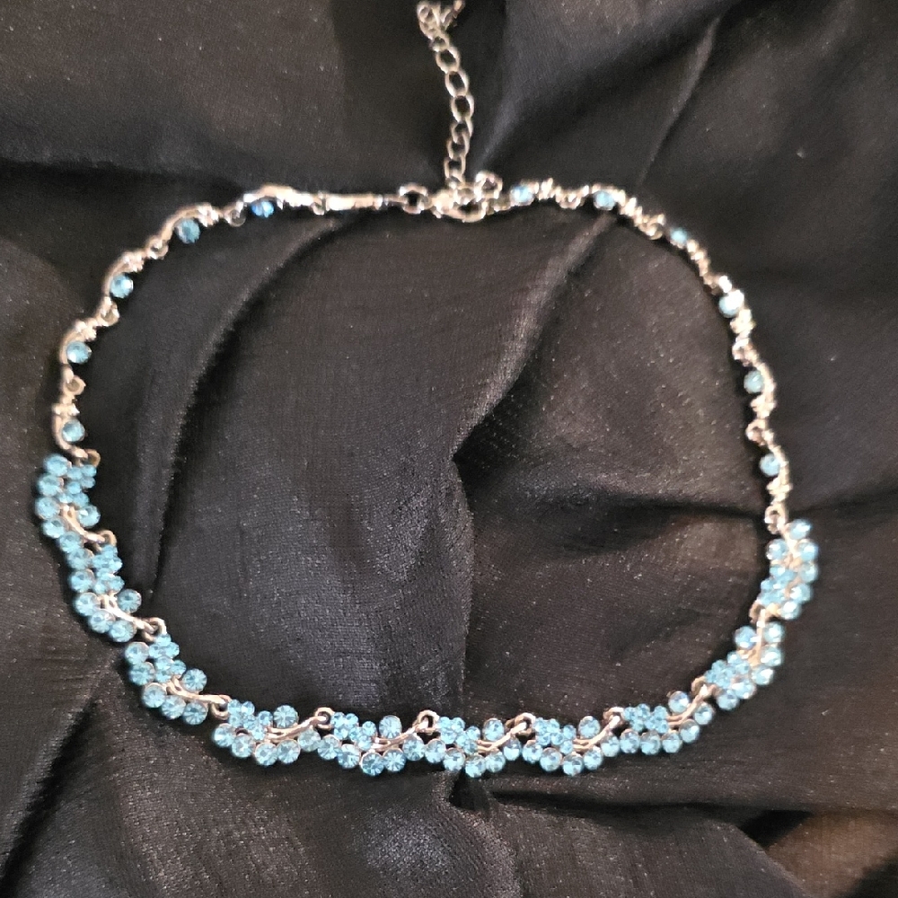 Elegant Silver Necklace with Blue Faceted Accents